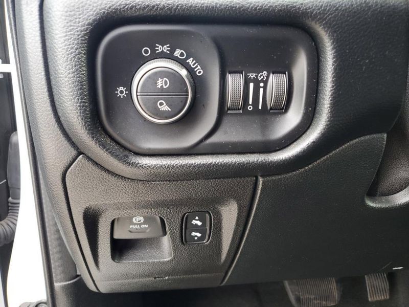 2020 RAM 1500 Laramie in a Bright White Clear Coat exterior color and Blackinterior. Johnson Dodge 601-693-6343 pixelmotiondemo.com 