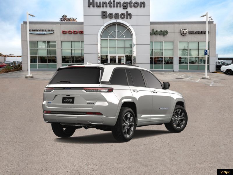 2023 Jeep Grand Cherokee 4xe Base 30th Anniversary 4x4 in a Bright White exterior color and Global Blackinterior. BEACH BLVD OF CARS beachblvdofcars.com 