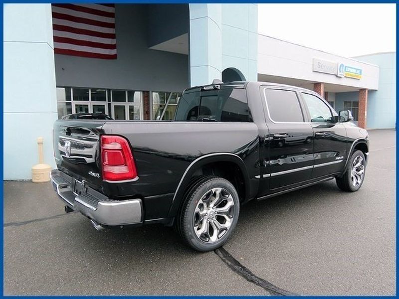 2024 RAM 1500 Limited in a Diamond Black Crystal Pearl Coat exterior color and Blackinterior. Papas Jeep Ram In New Britain, CT 860-356-0523 papasjeepram.com 