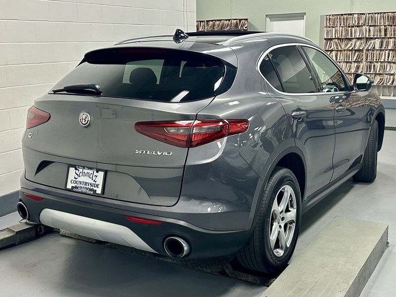 2021 Alfa Romeo Stelvio Sprint AWD w/Sunroof & Sound in a Vesuvio Gray Metallic exterior color and Black Heated Leatherinterior. Schmelz Countryside SAAB (888) 558-1064 stpaulsaab.com 