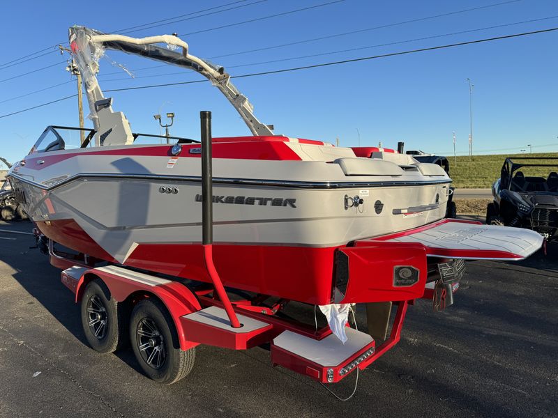 2024 MALIBU WAKESETTER 22 LSV  RED  LIGHT GRAPHITE  in a RED/GREY exterior color. Family PowerSports (877) 886-1997 familypowersports.com 