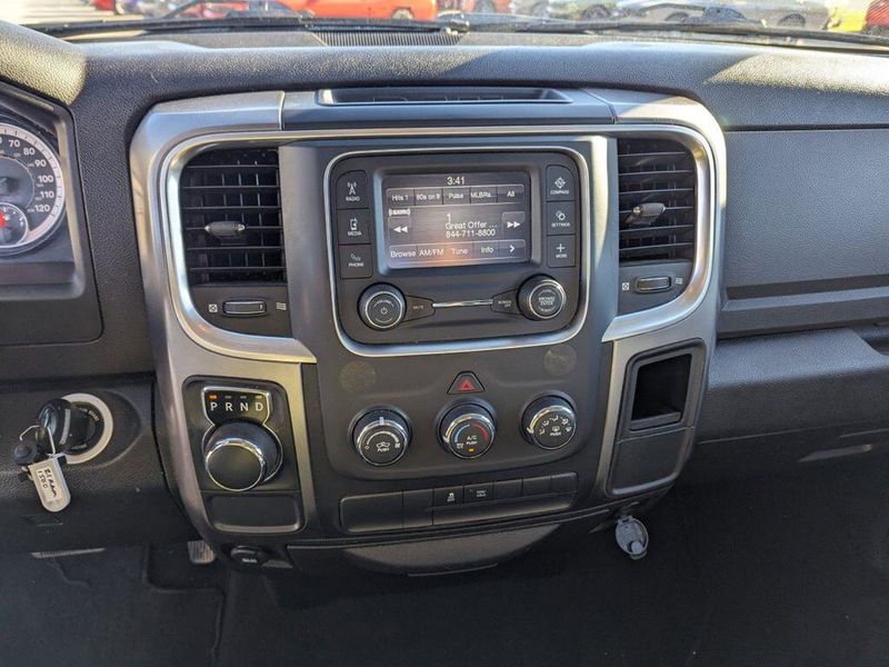 2021 RAM 1500 Classic SLT in a Granite Crystal Metallic Clear Coat exterior color and Diesel Gray/Blackinterior. Johnson Dodge 601-693-6343 pixelmotiondemo.com 