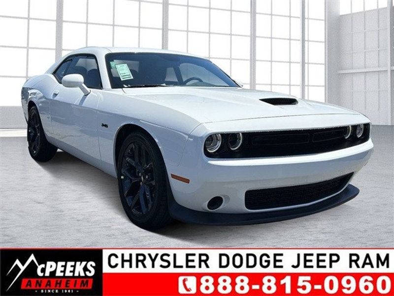 2023 Dodge Challenger R/T in a White Knuckle exterior color and Blackinterior. McPeek