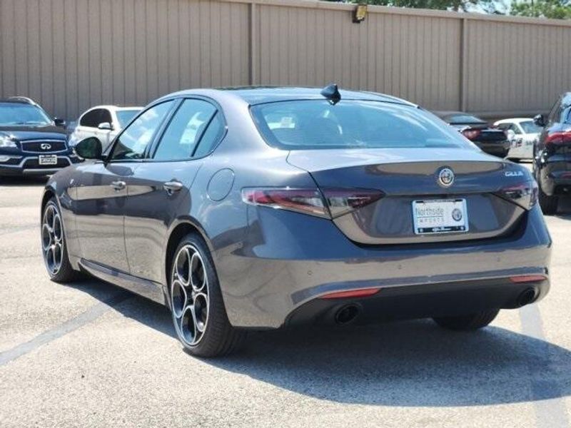 2024 Alfa Romeo Giulia Ti in a Vesuvio Gray Metallic exterior color and Blackinterior. Northside Imports Houston 281-475-4549 northsideimportshouston.com 