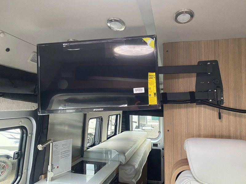 2024 ROADTREK Pivot  in a Silver Metallic exterior color and Chestnut Browninterior. Legacy Powersports 541-663-1111 legacypowersports.net 