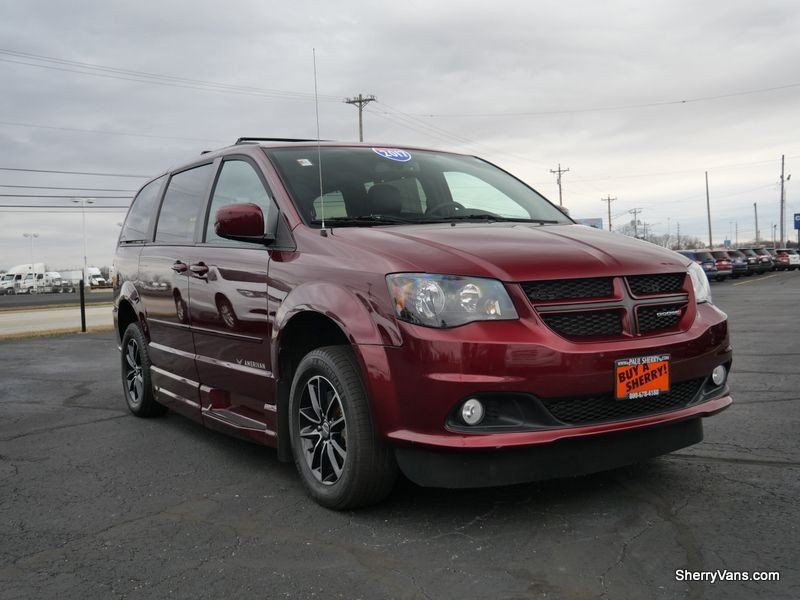 2017 Dodge Grand Caravan GT in a Octane Red Pearl Coat exterior color and Blackinterior. Paul Sherry Chrysler Dodge Jeep RAM (937) 749-7061 sherrychrysler.net 