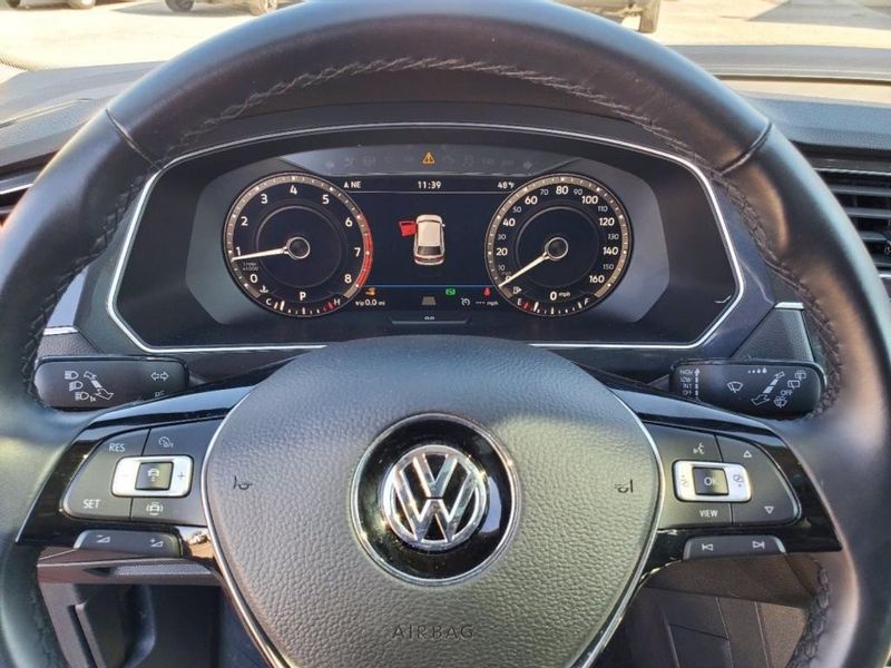 2019 Volkswagen Tiguan SEL Premium 4Motion in a ORANGE exterior color. Johnson Dodge 601-693-6343 pixelmotiondemo.com 