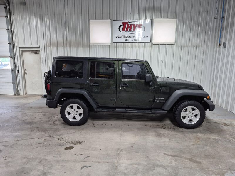 2011 Jeep Wrangler Unlimited SportImage 1