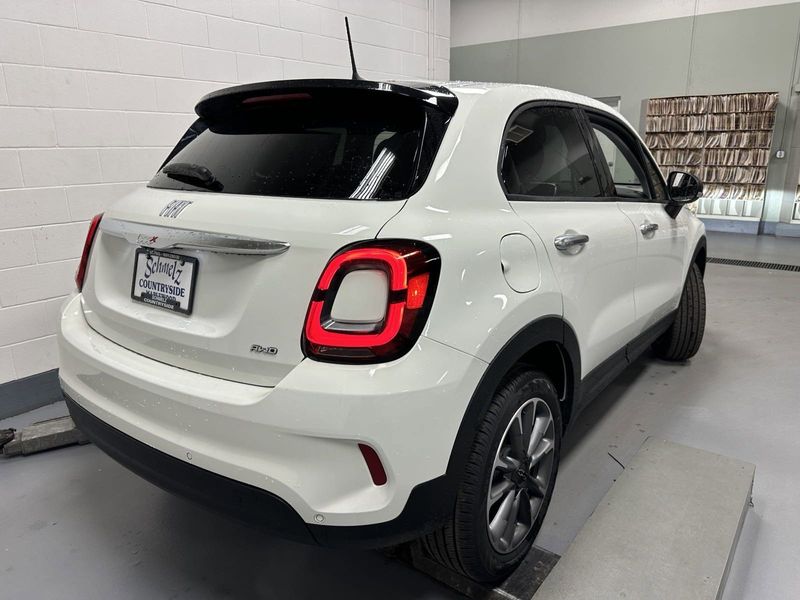 2023 Fiat 500x Pop Awd in a Bianco Gelato (White Clear Coat) exterior color and Blackinterior. Schmelz Countryside Alfa Romeo and Fiat (651) 968-0556 schmelzfiat.com 