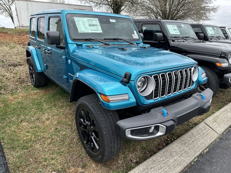 2024 Jeep Wrangler 4-door Sahara 4xe in a Bikini Pearl Coat exterior color. Gupton Motors Inc 615-384-2886 guptonmotors.com 