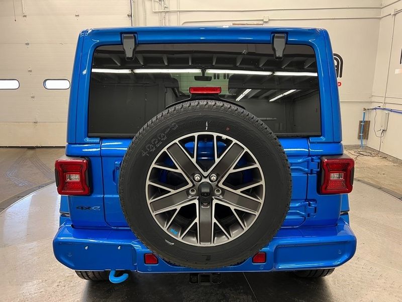 2022 Jeep Wrangler 4xe Unlimited High Altitude 4x4 in a Hydro Blue Pearl Coat exterior color and Blackinterior. Marina Chrysler Dodge Jeep RAM (855) 616-8084 marinadodgeny.com 