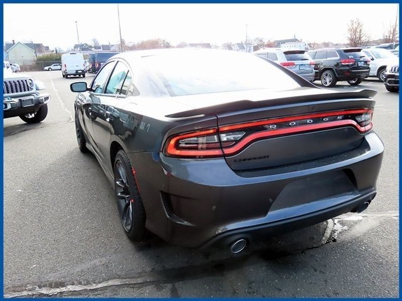 2023 Dodge Charger R/T in a Granite exterior color and Blackinterior. Papas Jeep Ram In New Britain, CT 860-356-0523 papasjeepram.com 