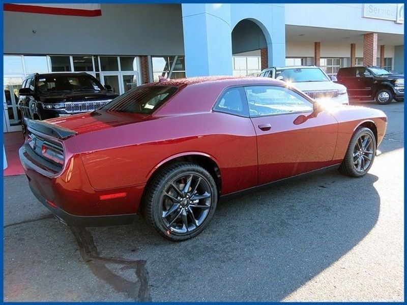2023 Dodge Challenger GT in a Octane Red exterior color and Blackinterior. Papas Jeep Ram In New Britain, CT 860-356-0523 papasjeepram.com 