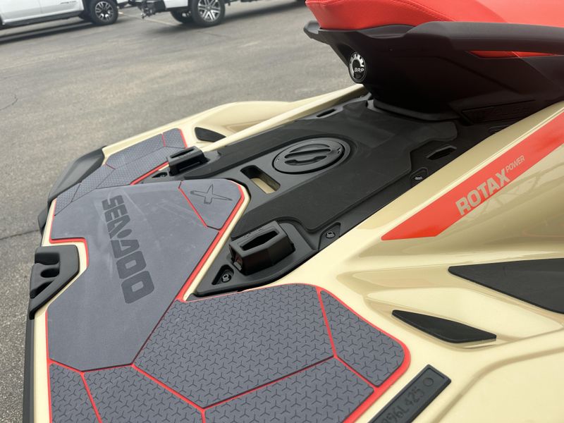 2025 SEADOO RXTX 325 WITH SOUND SYSTEM METALLIC TAN AND LAVA RED Image 2