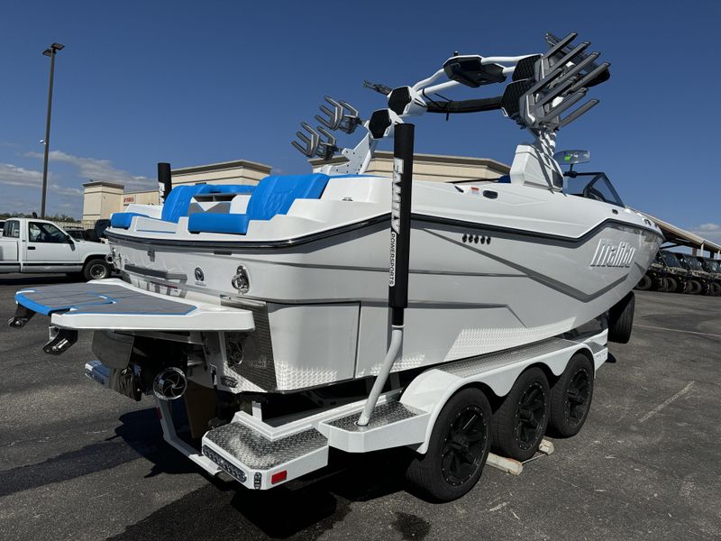 2025 MALIBU MSERIES M230  in a WHITE AND BLUE exterior color. Family PowerSports (877) 886-1997 familypowersports.com 