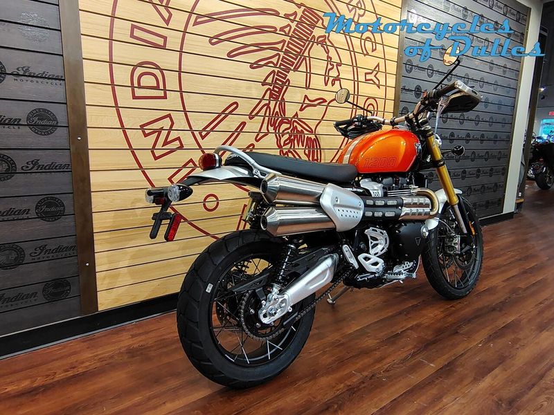 2024 Triumph Scrambler 1200 XE  in a Baja Orange/Phantom Black exterior color. Motorcycles of Dulles 571.934.4450 motorcyclesofdulles.com 