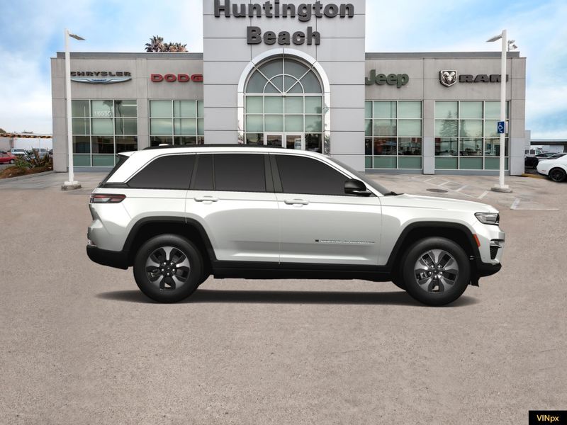 2023 Jeep Grand Cherokee 4xe Base 4x4 in a Bright White exterior color and Global Blackinterior. BEACH BLVD OF CARS beachblvdofcars.com 