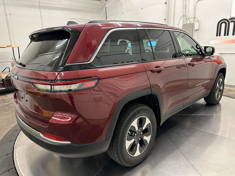 2024 Jeep Grand Cherokee 4xe in a Velvet Red Pearl Coat exterior color and Global Blackinterior. Marina Auto Group (855) 564-8688 marinaautogroup.com 