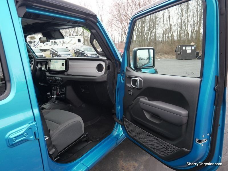 2024 Jeep Wrangler 4-door Sport S 4xe in a Bikini Pearl Coat exterior color and Blackinterior. Paul Sherry Chrysler Dodge Jeep RAM (937) 749-7061 sherrychrysler.net 