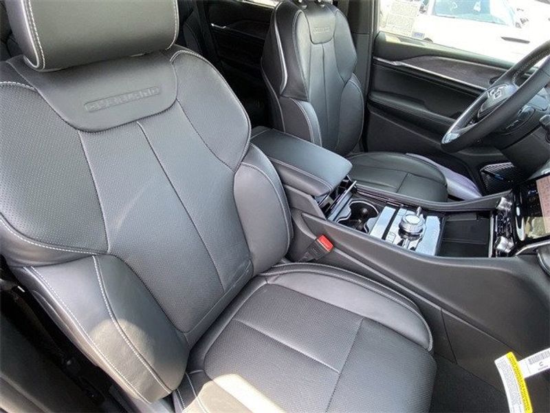 2023 Jeep Grand Cherokee Overland 4xe in a Diamond Black Crystal Pearl Coat exterior color and Global Blackinterior. McPeek