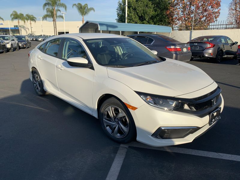 2020 Honda Civic Sedan LX in a White exterior color. BEACH BLVD OF CARS beachblvdofcars.com 