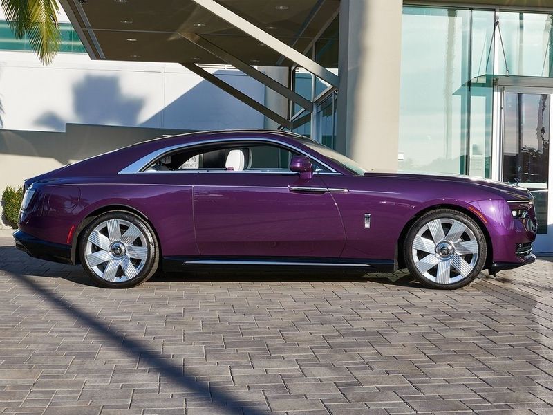 2024 Rolls-Royce Spectre  in a Twilight Purple exterior color and Arctic Whiteinterior. SHELLY AUTOMOTIVE shellyautomotive.com 