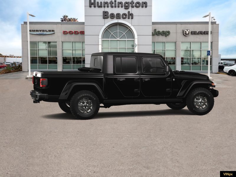 2024 Jeep Gladiator Willys 4x4 in a Black Clear Coat exterior color and Black Cloth LOW-Back BUCinterior. BEACH BLVD OF CARS beachblvdofcars.com 