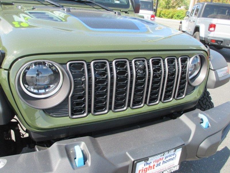 2024 Jeep Wrangler 4-door Rubicon 4xe in a Sarge Green Clear Coat exterior color and Blackinterior. Oak Harbor Motors Inc. 360-323-6434 ohmotors.com 
