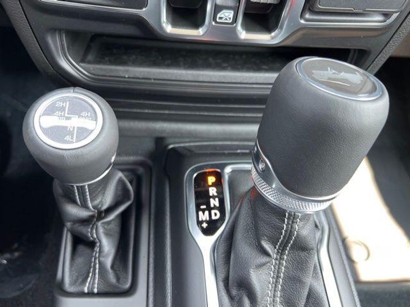 2023 Jeep Wrangler Sahara 4xe in a Silver Zynith Clear Coat exterior color and Blackinterior. Lakeshore CDJR Seaford 302-213-6058 lakeshorecdjr.com 