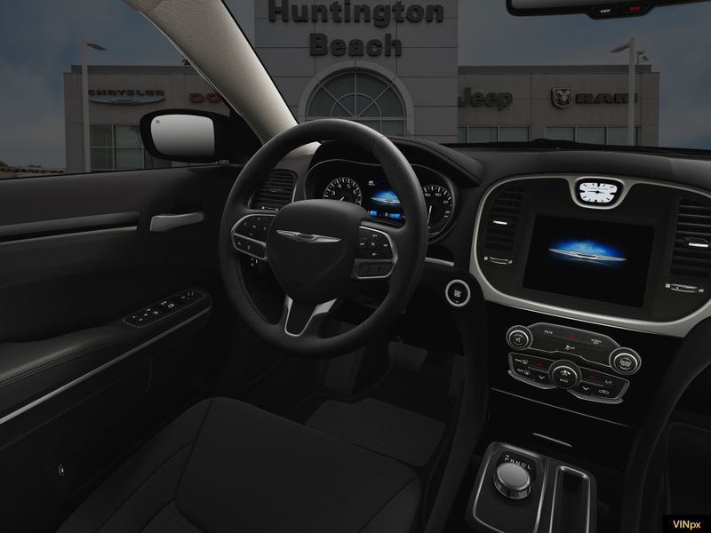 2023 Chrysler 300 Touring in a Bright White exterior color and Blackinterior. BEACH BLVD OF CARS beachblvdofcars.com 