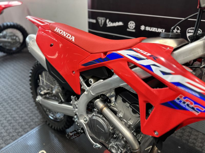2023 Honda CRF250R in a RED exterior color. Cross Country Powersports 732-491-2900 crosscountrypowersports.com 
