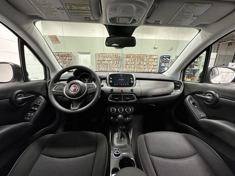 2023 Fiat 500x Pop Awd in a Bianco Gelato (White Clear Coat) exterior color and Blackinterior. Schmelz Countryside Alfa Romeo and Fiat (651) 968-0556 schmelzfiat.com 