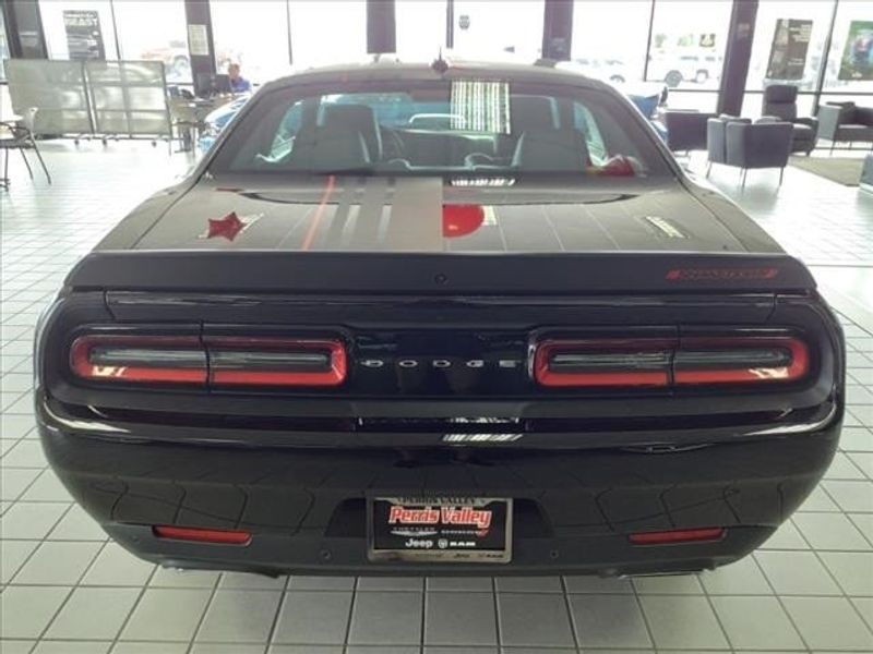 2023 Dodge Challenger R/T Scat Pack Widebody in a Pitch Black Clear Coat exterior color and Blackinterior. Perris Valley Auto Center 951-657-6100 perrisvalleyautocenter.com 