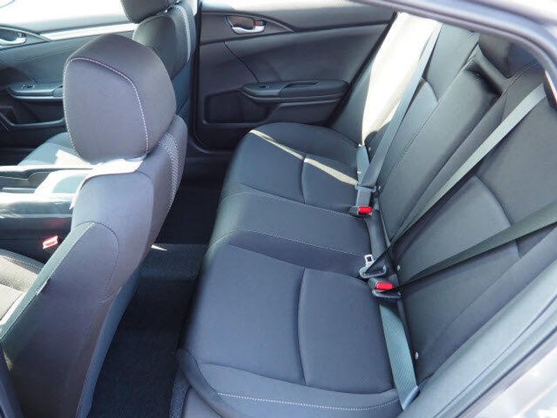 2020 Honda Civic Sedan EX in a Lunar Silver Metallic exterior color and Blackinterior. BEACH BLVD OF CARS beachblvdofcars.com 