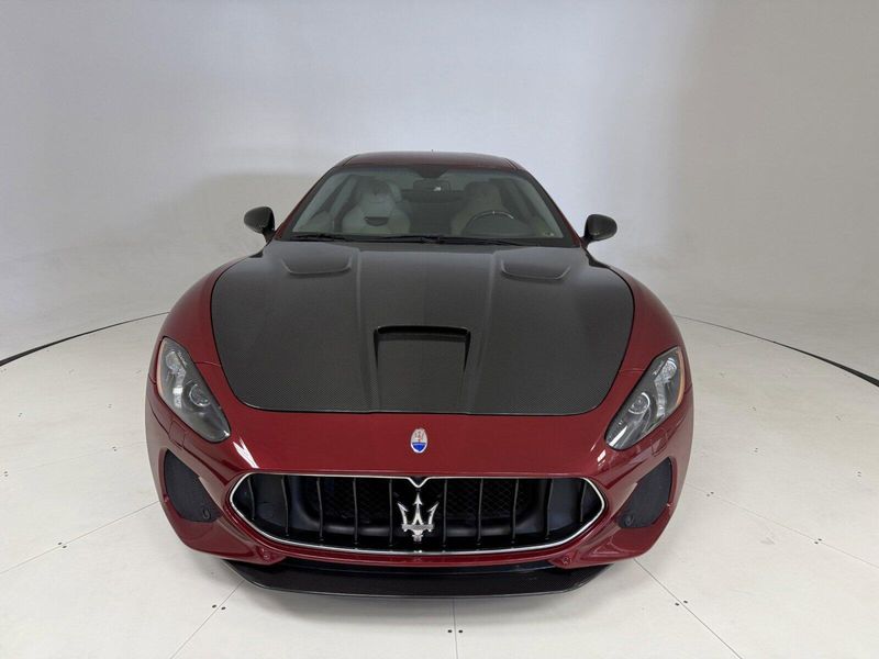 2018 Maserati GranTurismo MC in a Rosso Trionfale Metallic exterior color and Bianco Pregiatointerior. Karma Newport Beach (844) 527-6262 karmanb.com 