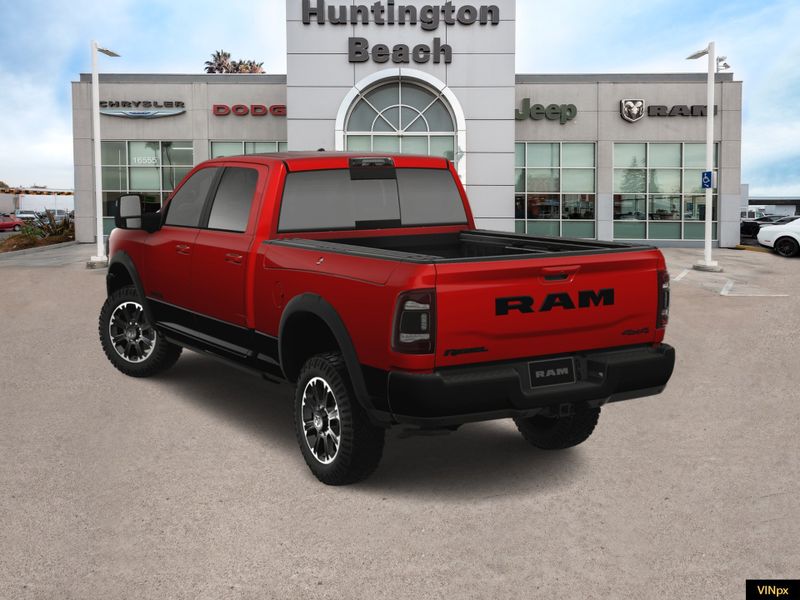 2023 RAM 2500 Power Wagon Rebel Crew Cab 4x4 in a Flame Red exterior color and Blackinterior. BEACH BLVD OF CARS beachblvdofcars.com 