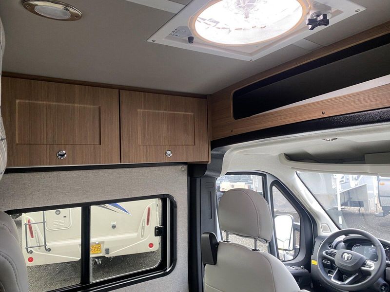 2024 ROADTREK Pivot  in a Silver Metallic exterior color and Chestnut Browninterior. Legacy Powersports 541-663-1111 legacypowersports.net 