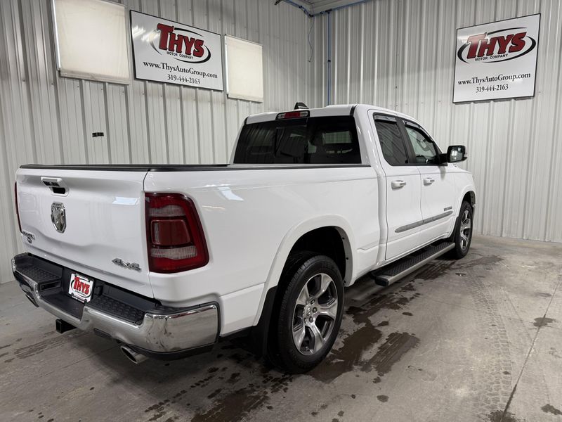 Used 2020 RAM 1500 Laramie in a Bright White Clear Coat exterior color and Blackinterior. Thys Motor Company 319-318-6640 thysmotorco.com 