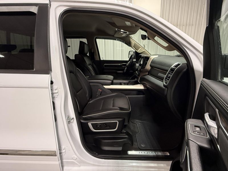 Used 2020 RAM 1500 Laramie in a Bright White Clear Coat exterior color and Blackinterior. Thys Motor Company 319-318-6640 thysmotorco.com 
