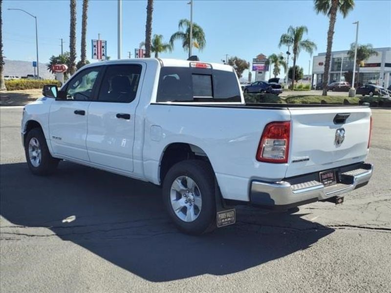 2024 RAM 1500 Big Horn Lone Star in a Bright White Clear Coat exterior color and Blackinterior. Perris Valley Auto Center 951-657-6100 perrisvalleyautocenter.com 