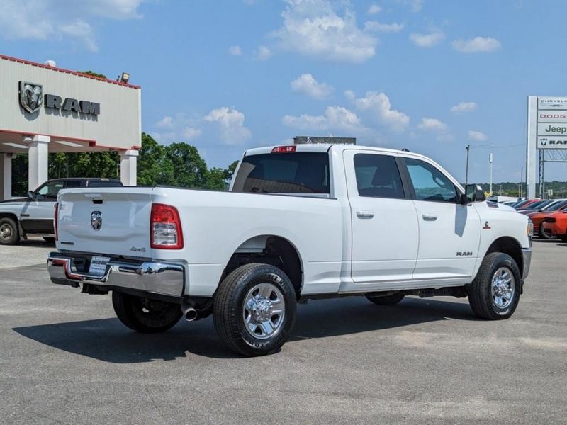 2020 RAM 2500 Big Horn in a Bright White Clear Coat exterior color. Johnson Dodge 601-693-6343 pixelmotiondemo.com 