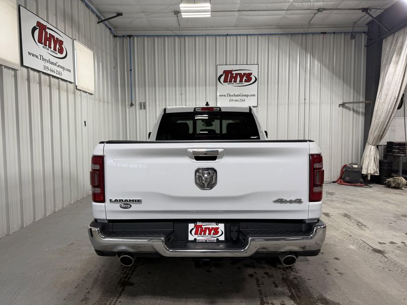 Used 2020 RAM 1500 Laramie in a Bright White Clear Coat exterior color and Blackinterior. Thys Motor Company 319-318-6640 thysmotorco.com 