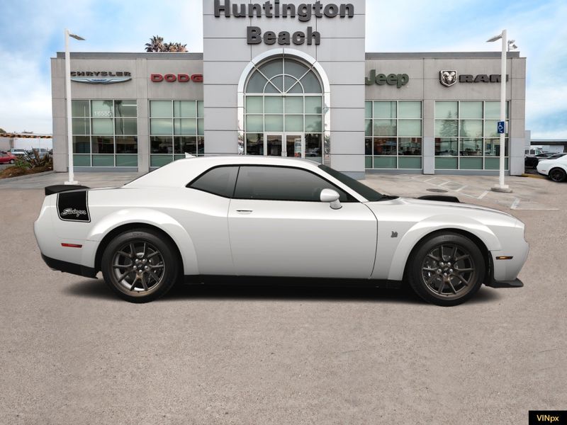 2023 Dodge Challenger R/T Scat Pack Widebody Swinger Special Edition in a White Knuckle exterior color and Blackinterior. BEACH BLVD OF CARS beachblvdofcars.com 