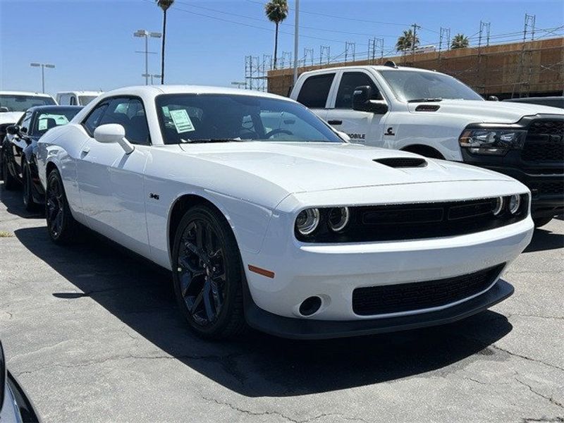 2023 Dodge Challenger R/T in a White Knuckle exterior color and Blackinterior. McPeek