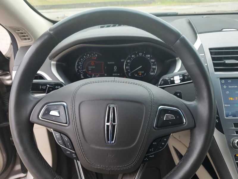 2020 Lincoln MKZ Reserve in a BROWN exterior color. Johnson Dodge 601-693-6343 pixelmotiondemo.com 