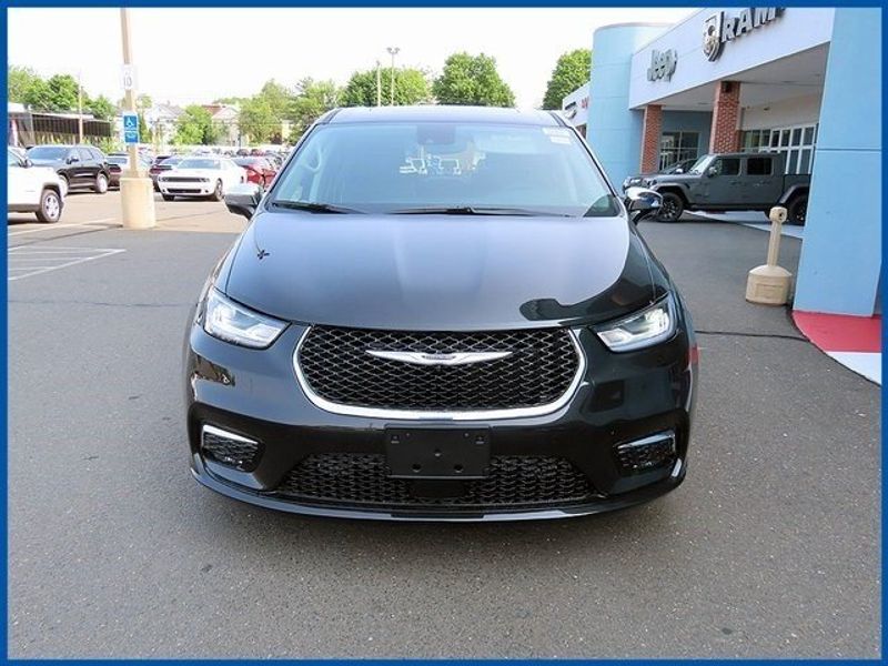 2023 Chrysler Pacifica Hybrid Limited in a Brilliant Black Crystal Pearl Coat exterior color and Black/Alloy/Blackinterior. Papas Jeep Ram In New Britain, CT 860-356-0523 papasjeepram.com 