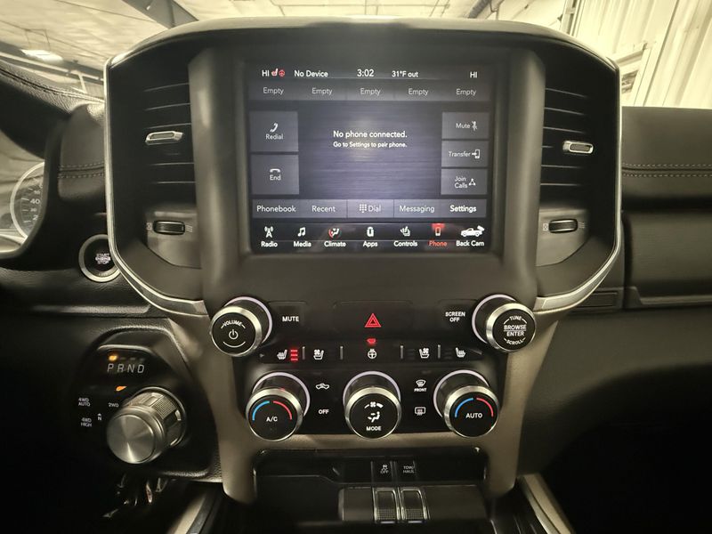 Used 2020 RAM 1500 Laramie in a Bright White Clear Coat exterior color and Blackinterior. Thys Motor Company 319-318-6640 thysmotorco.com 