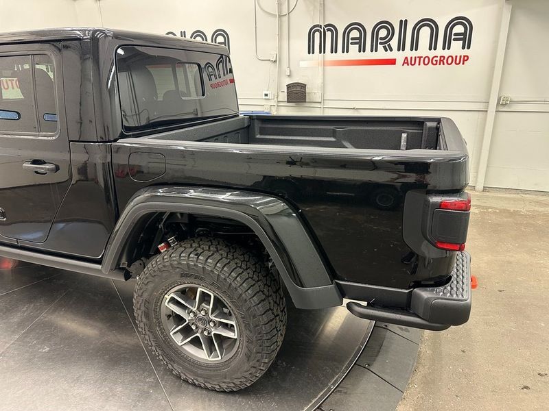 2024 Jeep Gladiator Mojave X 4x4 in a Black Clear Coat exterior color. Marina Chrysler Dodge Jeep RAM (855) 616-8084 marinadodgeny.com 