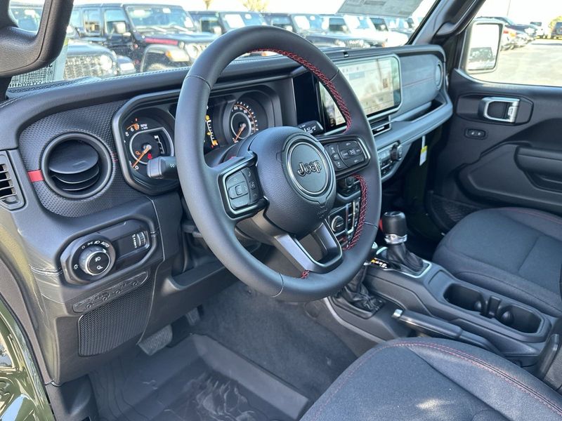 2024 Jeep Gladiator Rubicon 4x4 in a Sarge Green Clear Coat exterior color. Gupton Motors Inc 615-384-2886 guptonmotors.com 