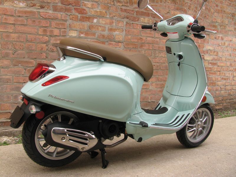 2023 Vespa Primavera 50   in a Verde Amabile exterior color. Motoworks Chicago 312-738-4269 motoworkschicago.com 